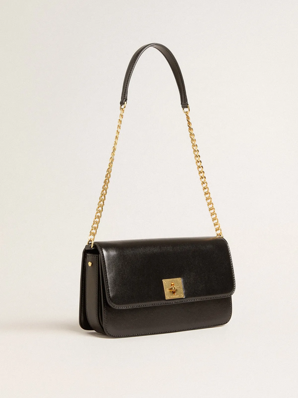 Gioia Bag in black boarded leather with gold details