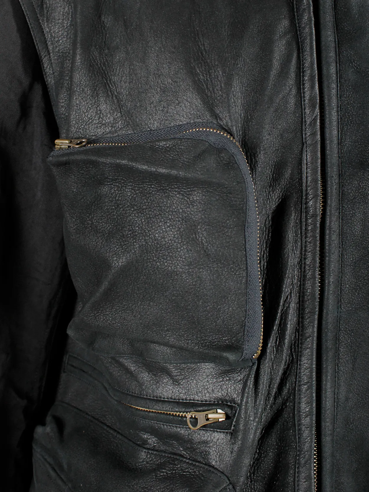 Pour Deux black leather jacket with cargo pockets and contrasting sleeves and back