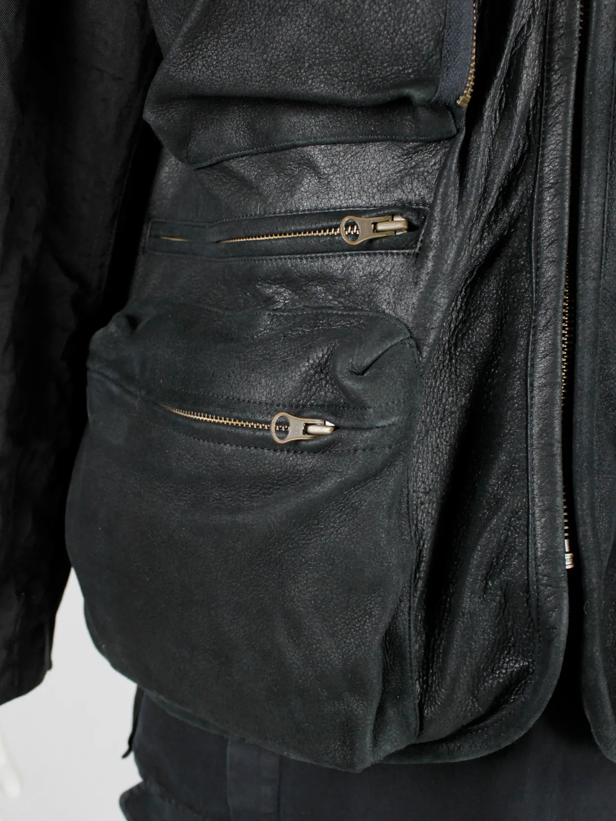 Pour Deux black leather jacket with cargo pockets and contrasting sleeves and back