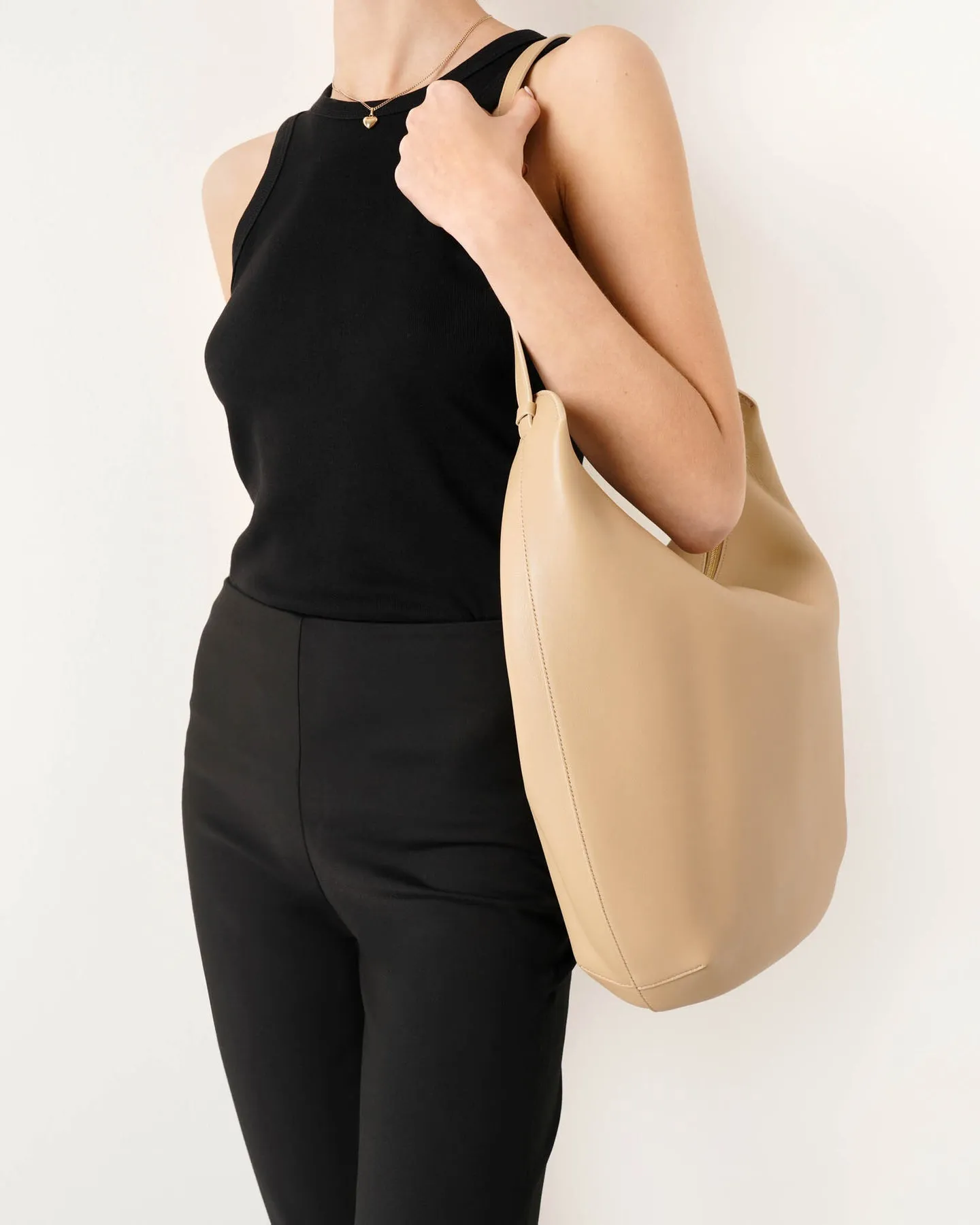 The Row N/S Allie light beige leather bag